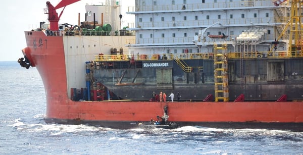 A boarding team from the ITS Martinengo boards the Zhen Hua 7 in the Gulf of Guinea after it was attacked by pirates on November 13, 2020