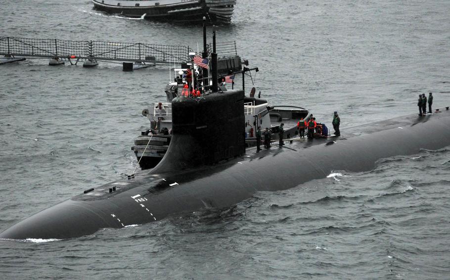 The Seawolf-class attack submarine USS Connecticut returns to port at Naval Base Kitsap-Bremerton