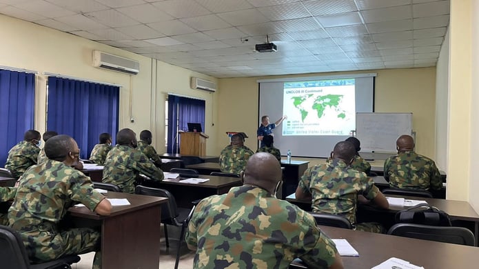 U.S. Coast Guard Instructor, LT Brandon Taylor, providing training on United Nations Convention on the Law of the Sea during the training program in Lagos.